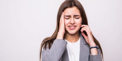 Portrait of stressed businesswoman over white background Portrait of stressed businesswoman isolated over white background